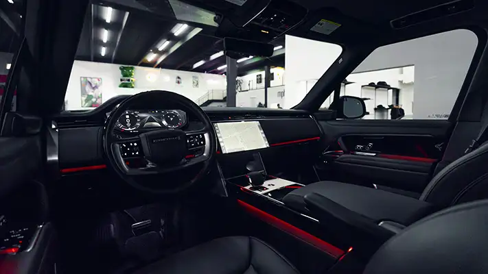 black-on-black-range-rover-rental-dashboard-view-mph-club